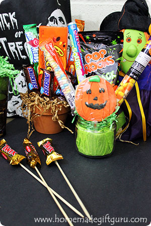 You can use just about any jar, cup, tin, pot or vase you can think of to make your own unique Halloween candy arrangements. Click through for tips and tricks!